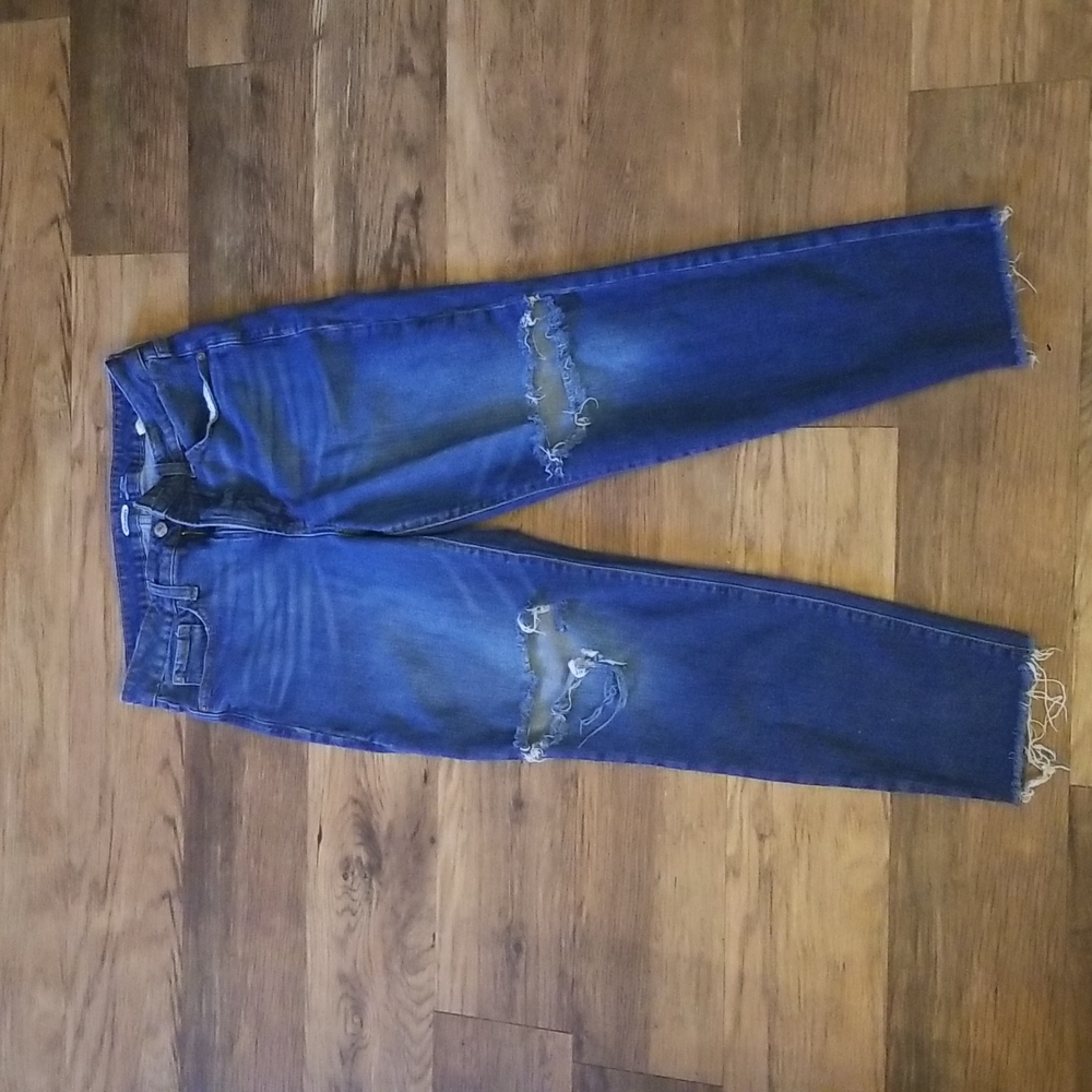 Ripped blue jeans